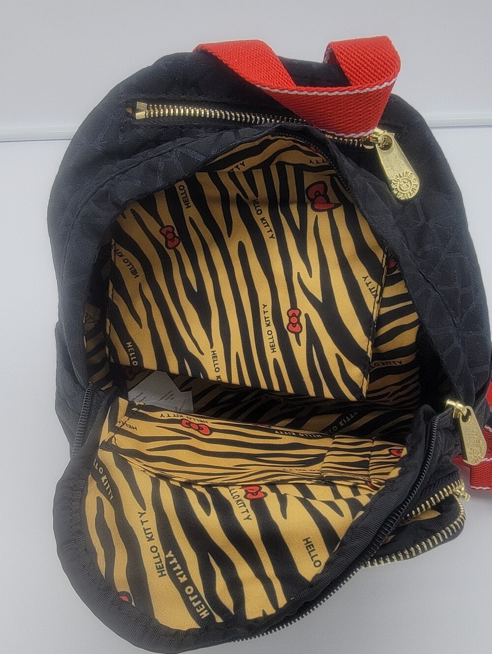 Kipling Black Quilted Mini Backpack with Hello Kitty Tiger Patch and Red Straps - Picture 3 of 6